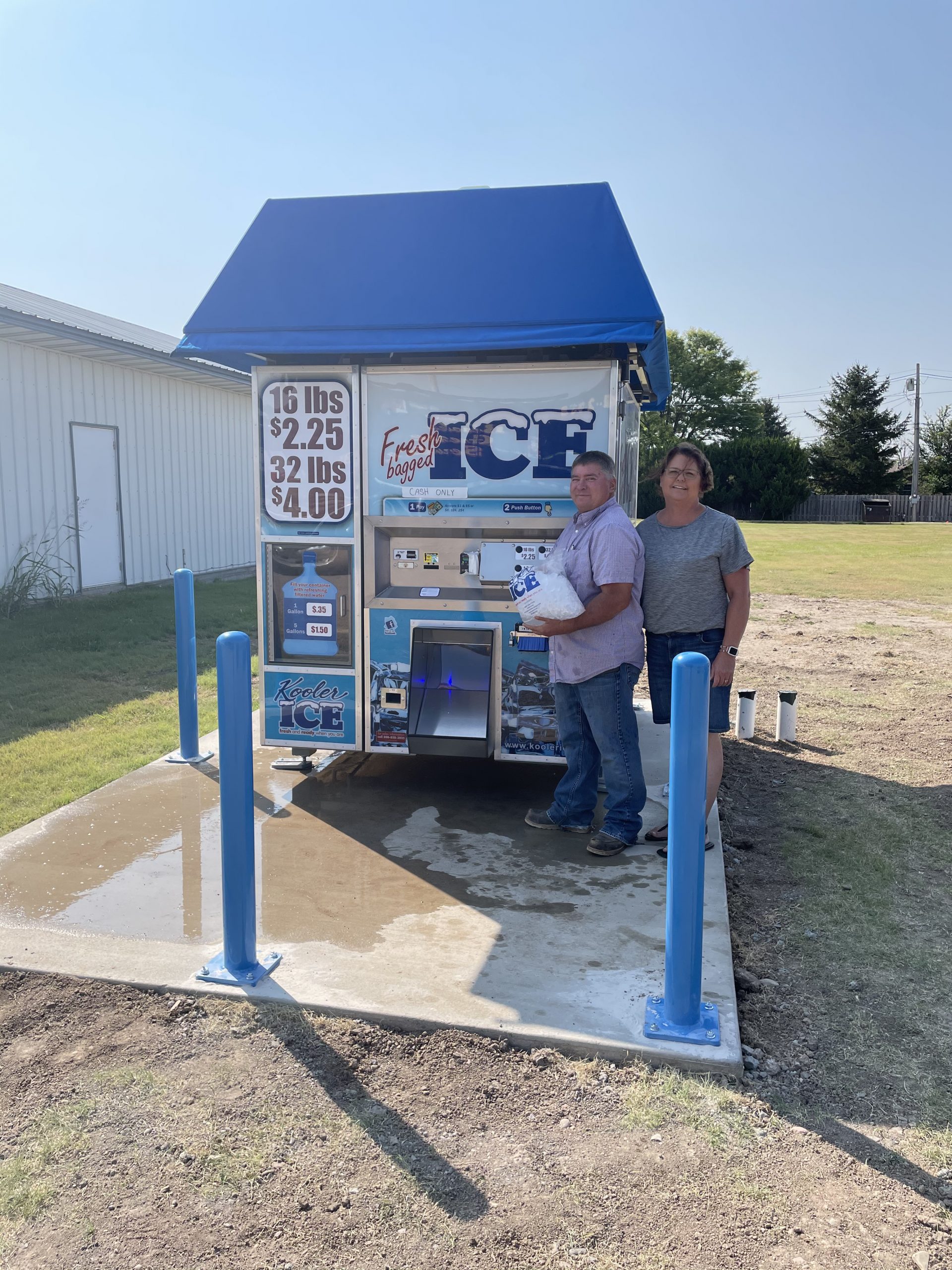 Machine owner Gary Morgan and his new IM1500 Kooler Ice vending machine